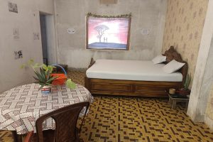 Full view of Radha Krish Suite Room 102 at Hotel Kalzug, a super luxury couple-friendly room in Katihar with premium amenities.