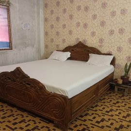 Radha Krish Suite Room 102 at Hotel Kalzug, a super luxury stay in Katihar with a super king bed and a 7-inch ultra-soft mattress.