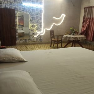 Romantic couple-friendly luxury suite at Hotel Kalzug - Radha Krish Suite Room 102, designed for comfort and relaxation.Romantic couple-friendly luxury suite at Hotel Kalzug - Radha Krish Suite Room 102, designed for comfort and relaxation.
