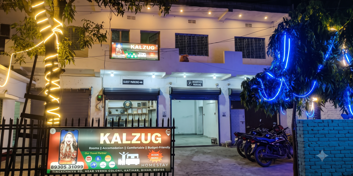 hotel-kalzug-katihar-parking-area-and -bike-rental-exterior-night-view